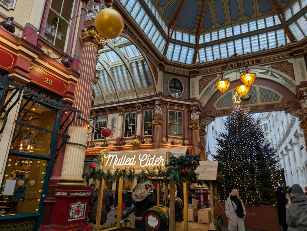 People shopping for Christmas gifts in a festive market in London